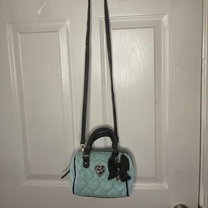 Betsey Johnson Blue heart quilted & black trims mini barrel crossbody bag .